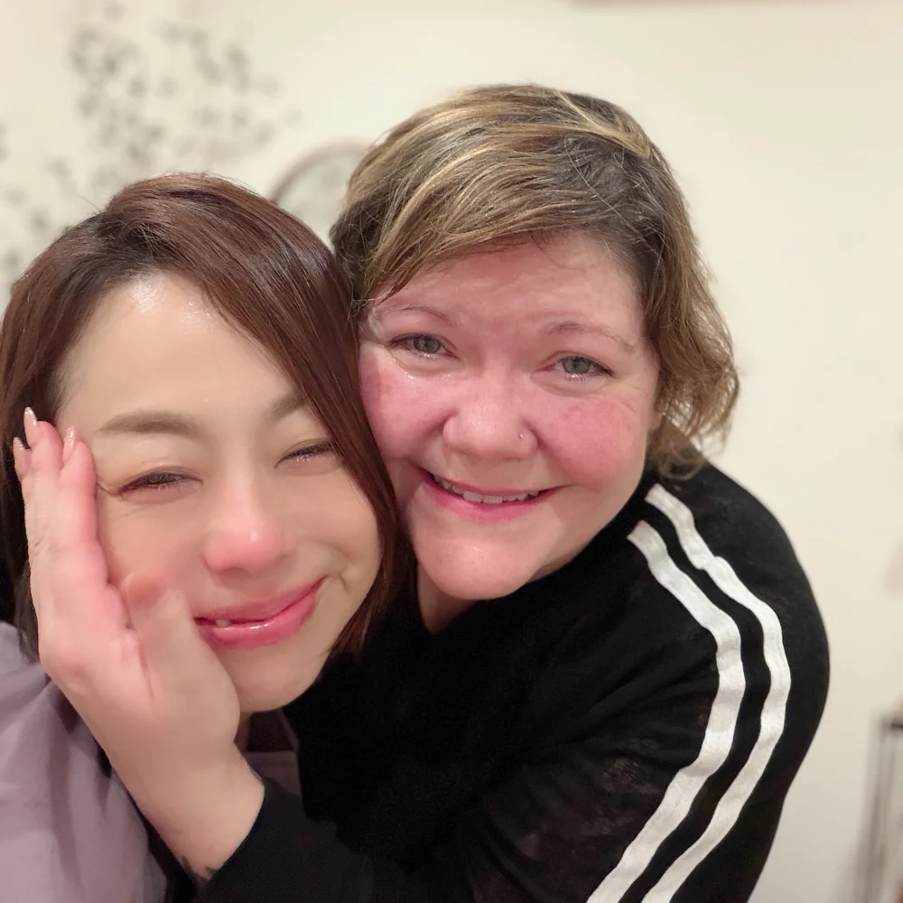 A shared smile with a guest at TOMORI — memory 4 of 4
